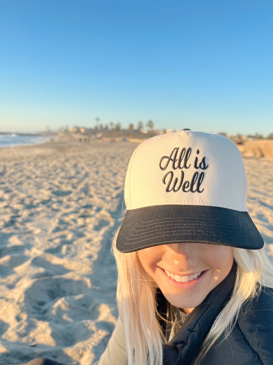 All Is Well- Embroidered Trucker Hat- Black/Natural Hat