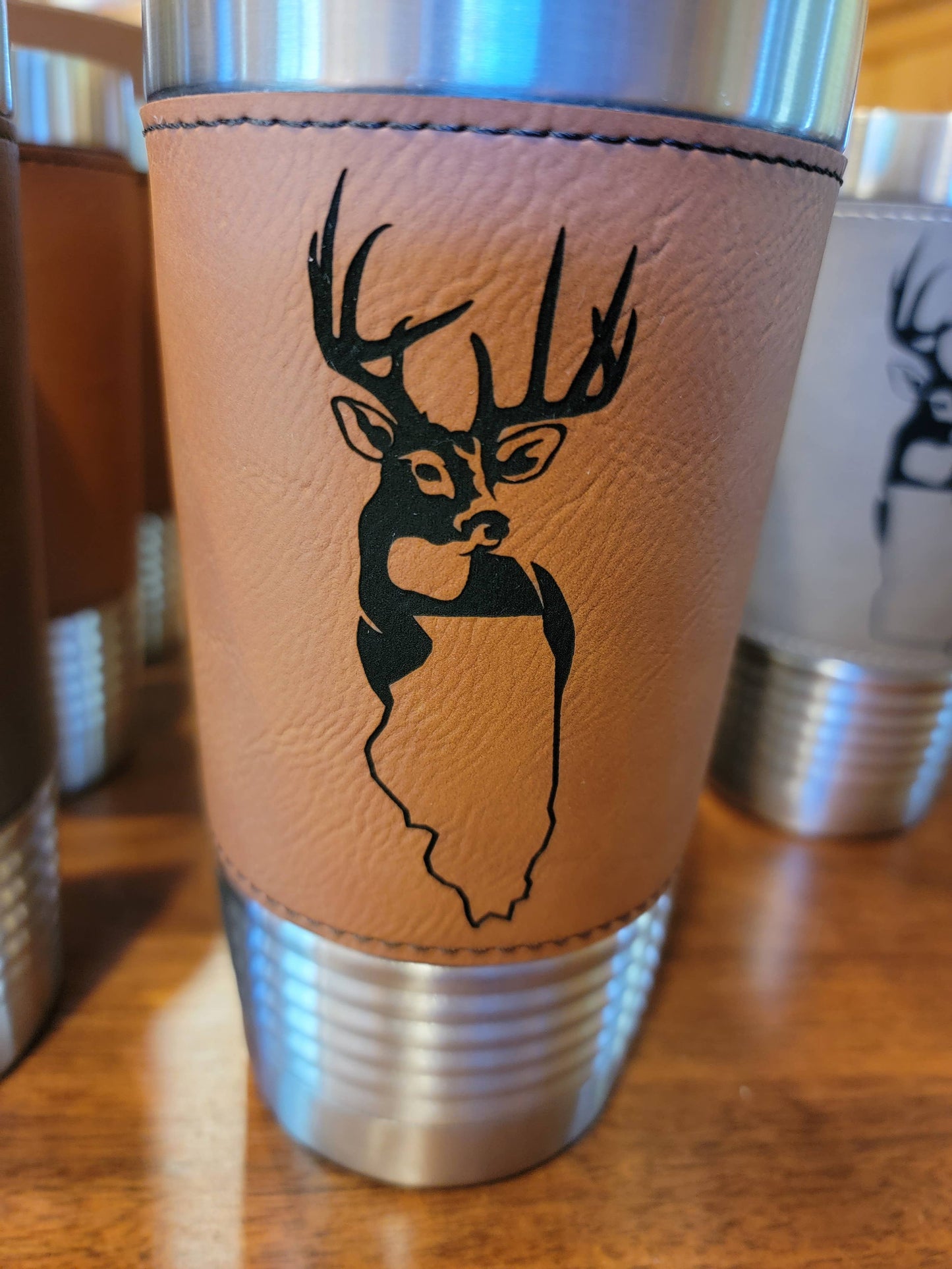 Whitetail State Engraved Leather Insulated Tumbler. MISSISSIPPI